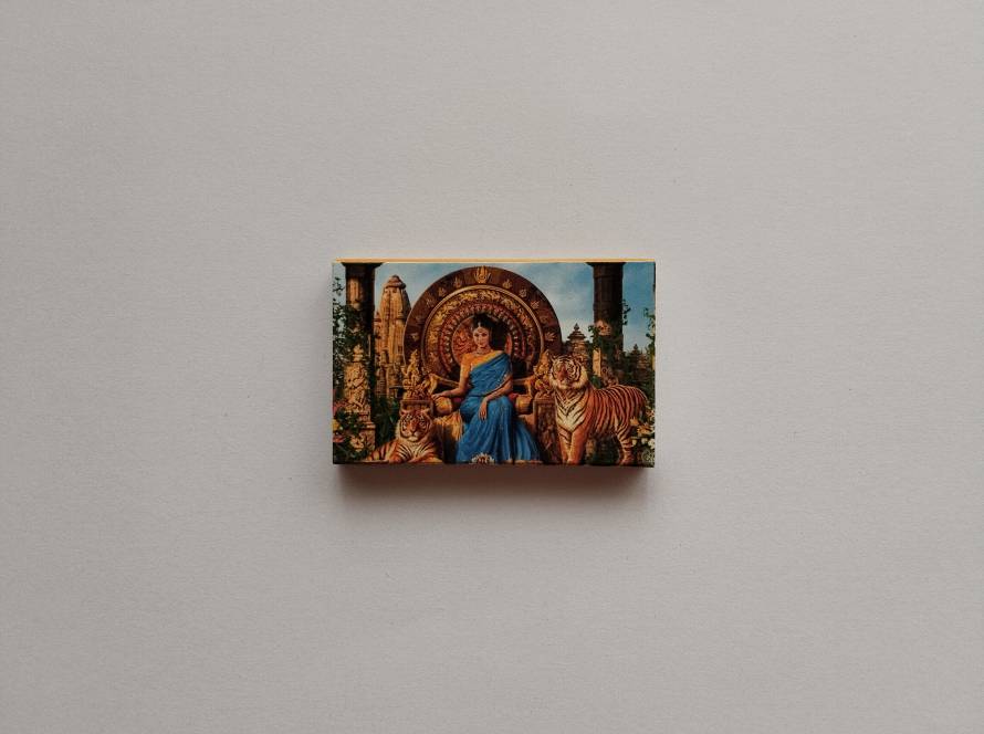 Regal woman seated with tigers, ornate mythological Asian matchbox artwork
