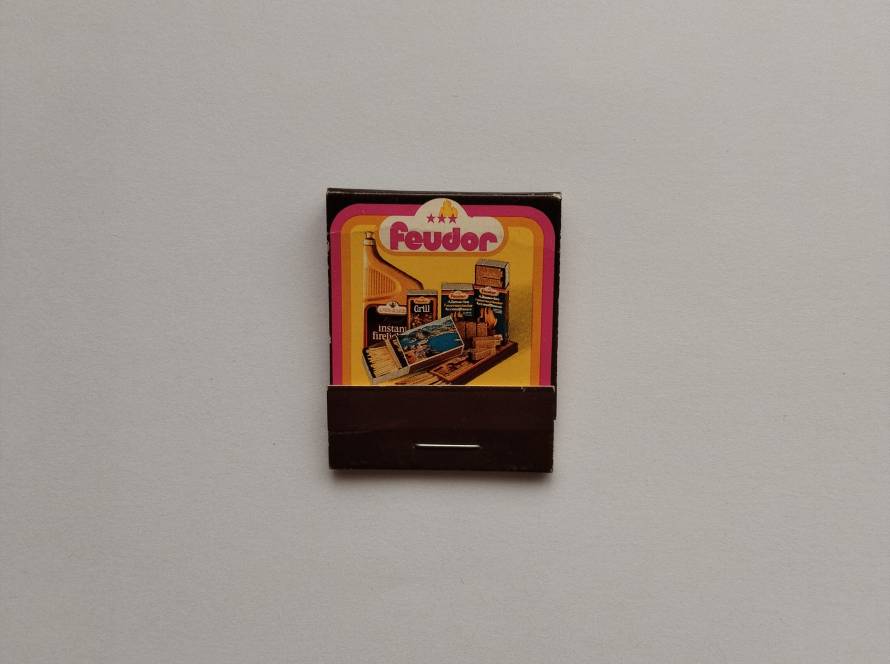Feuder branded vintage matchbox featuring household product assortment