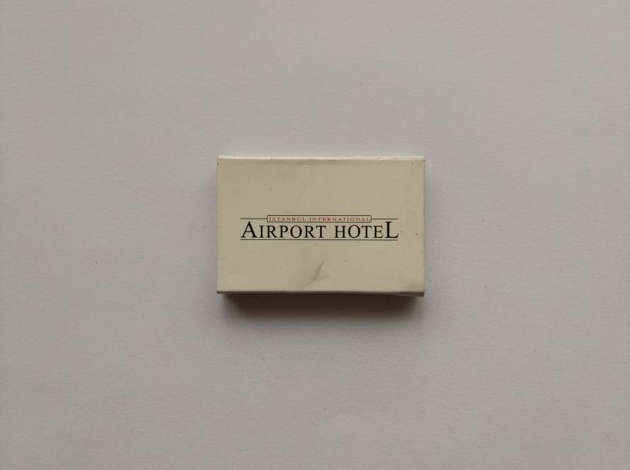 “Istanbul International Airport Hotel” promotional matchbox; minimalist black typography on cream background.
