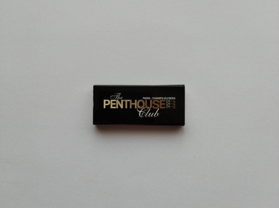 The Penthouse Club Paris – Champs-Élysées branding with full address and website
