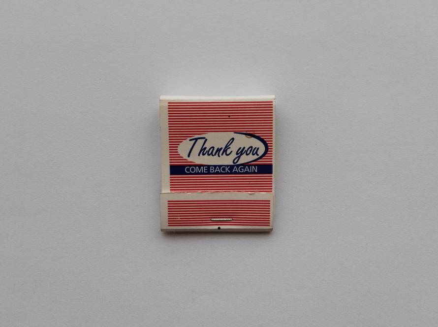 Patriotic matchbox featuring U.S. flag and “Freedom” text. Marked “D.D. Bean & Sons Co., Jaffrey, NH” at base. Vintage American promotional design.