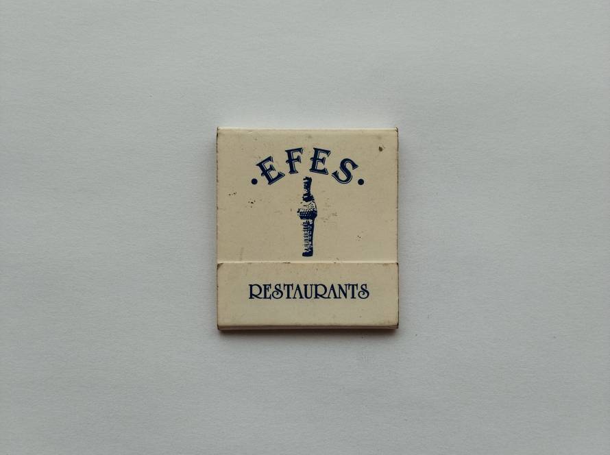 Back side of Efes Restaurants matchbook listing two London locations with contact details, clean and functional design.