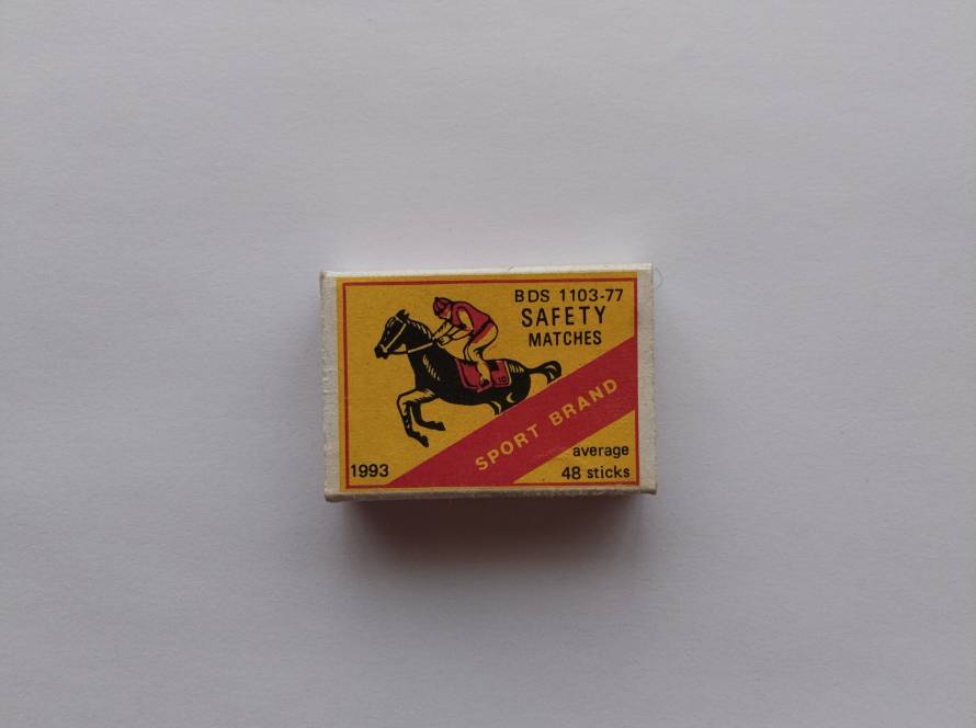 Colorful 1993 “Sport Brand” safety matches box with horse and rider illustration, typical of Eastern European designs.