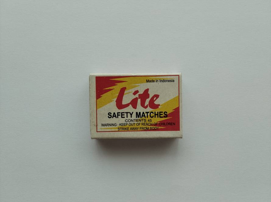 Colorful “Lite Safety Matches” box made in Indonesia with bold red and yellow graphics.