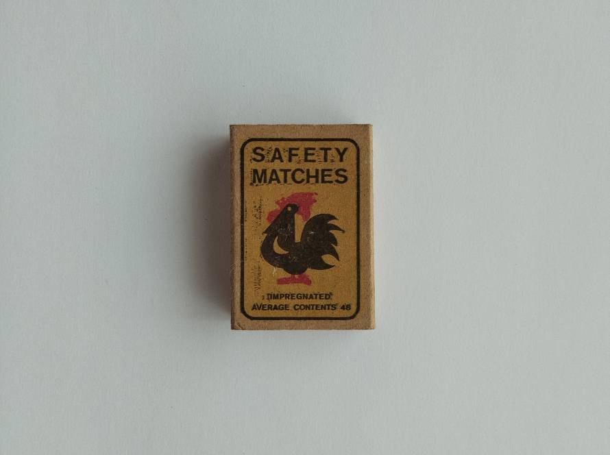 Dromex (Poland) safety matches featuring a rooster graphic and export markings in multiple languages.