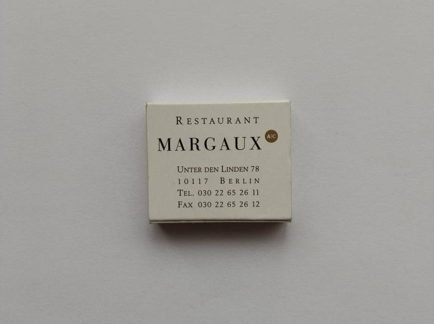 Advertising matchbox for Restaurant Margaux, located at Unter den Linden 78 in Berlin, associated with AC Hotels branding.