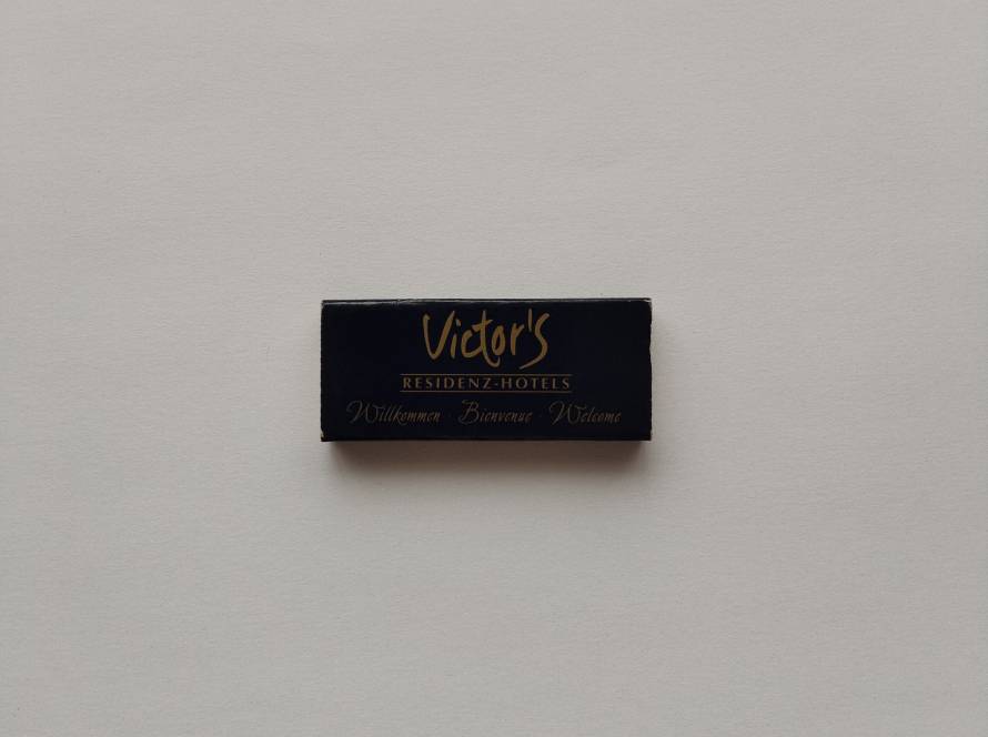 Victor’s Residenz Hotels branded matchbox with elegant gold-on-black design.