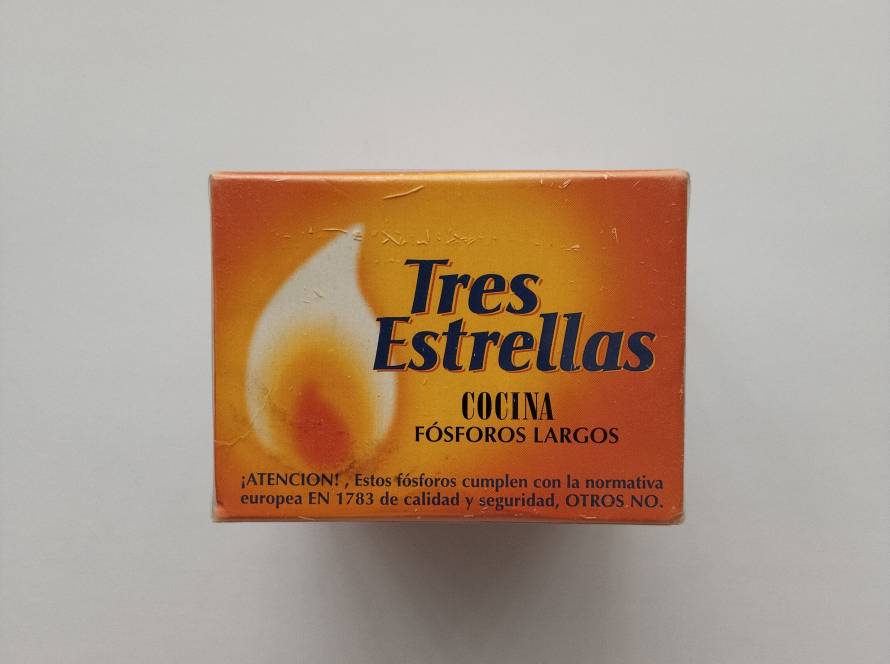 “Tres Estrellas” kitchen matches with bold orange packaging.