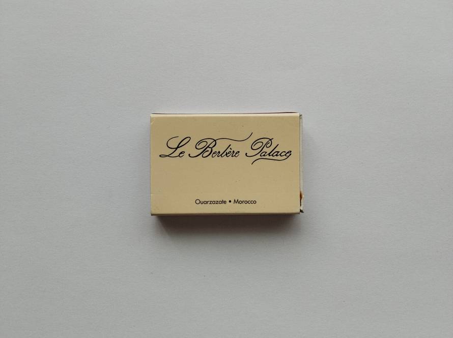 Le Berbère Palace hotel matchbox from Ouarzazate, Morocco. Elegant script typography with classic luxury hotel appeal.