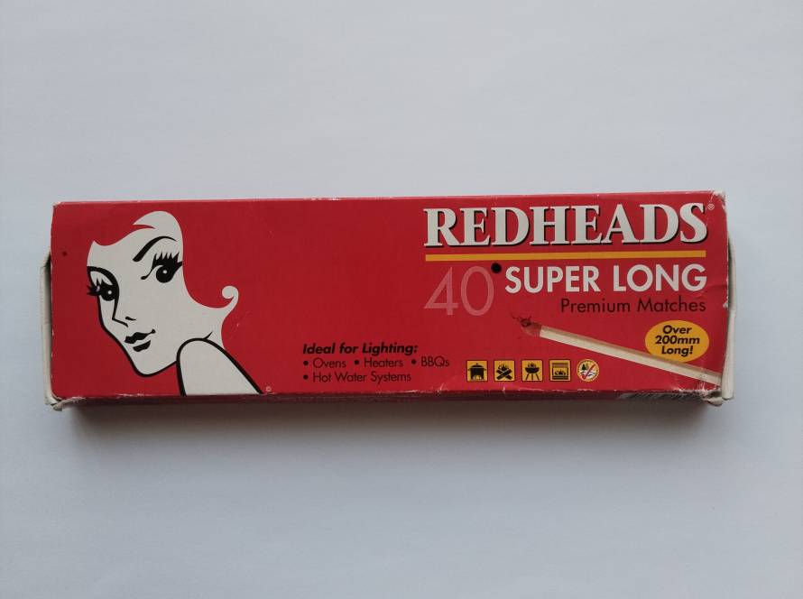 Redheads “Super Long” premium matches box, practical use design with bold red branding.