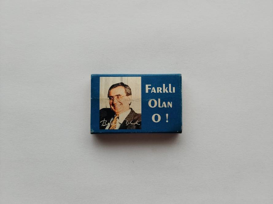 Liberal Demokrat Parti themed matchbox with dolphin symbol; notable political memorabilia.