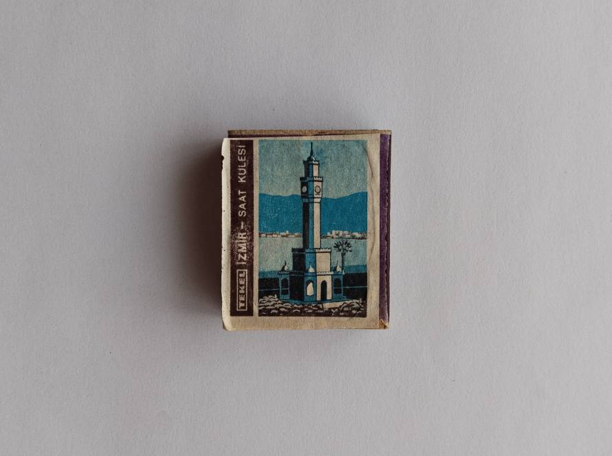 Iconic İzmir Clock Tower featured on a classic Turkish matchbox.