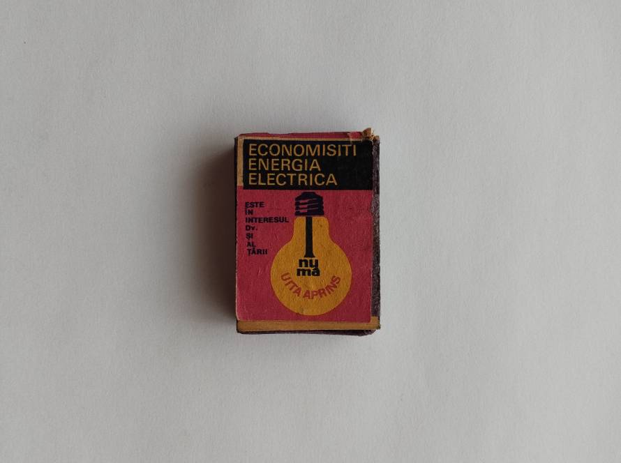 Vintage-style promotional label emphasizing electricity usage and energy awareness with bold graphic design.
