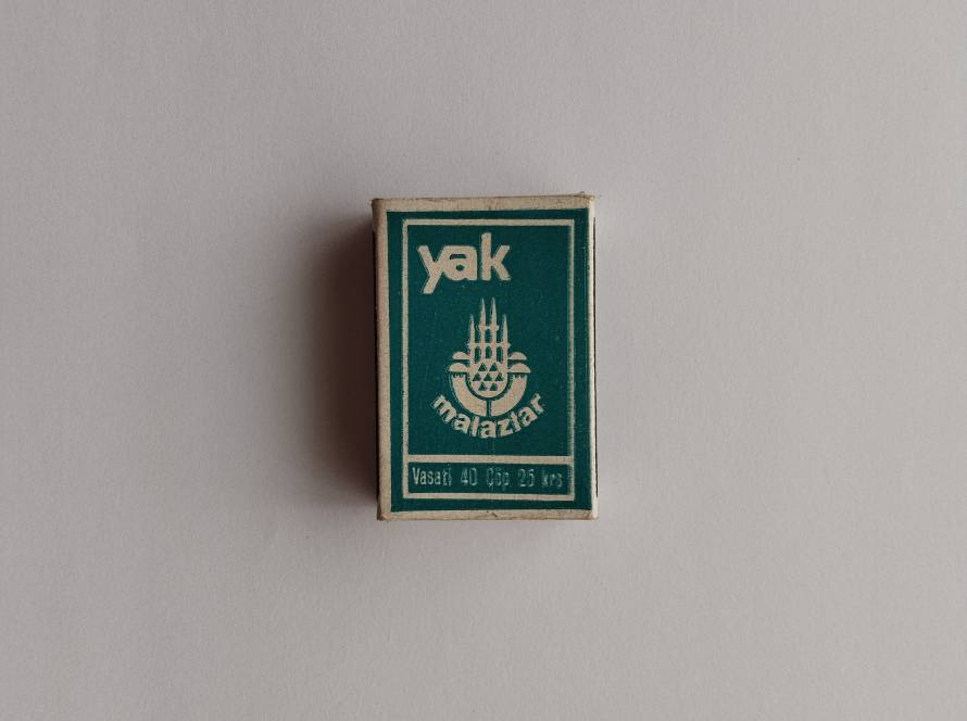 Green Yak Malazlar design with wheat-style emblem and “Vasati 40 çöp” marking.