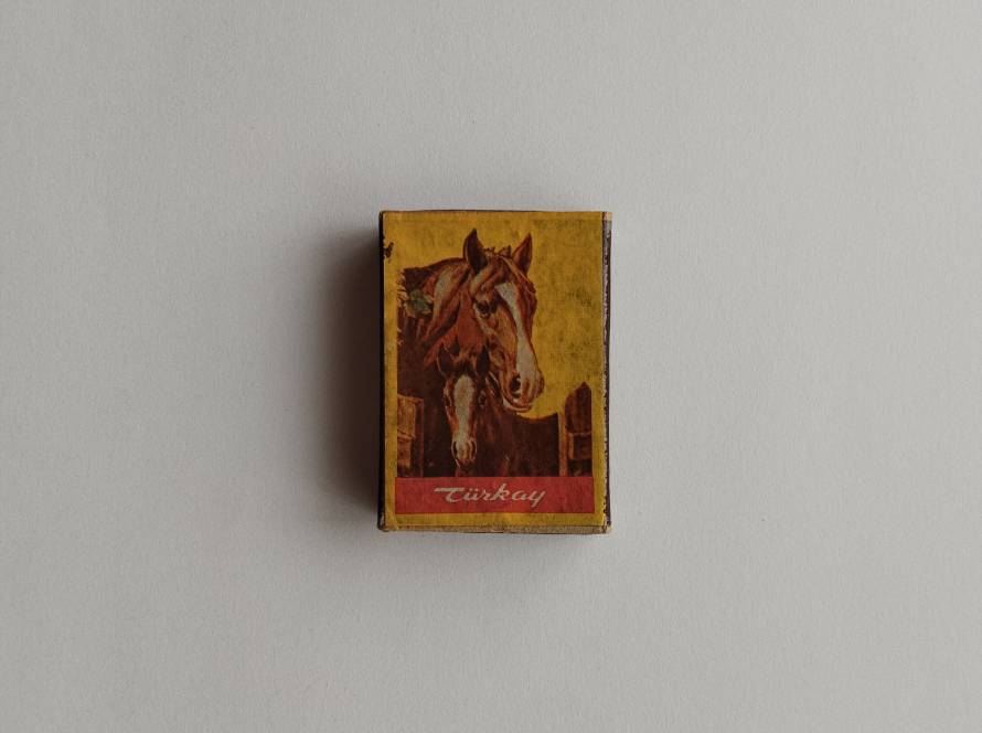 Classic Türkay matchbox displaying a detailed portrait of a horse. A traditional animal-themed design popular among Turkish matchbox collectors.