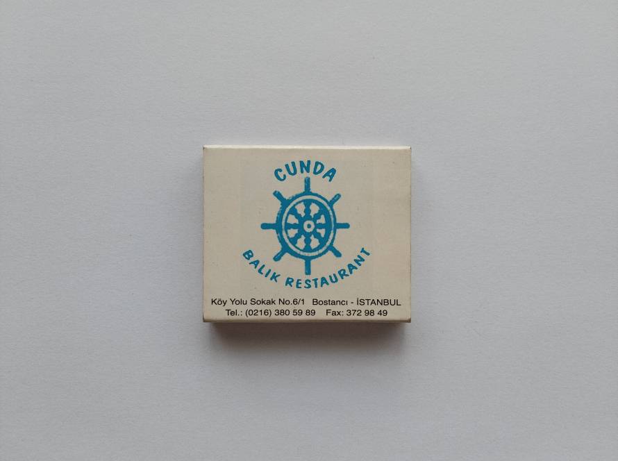 Advertising matchbox issued for Cunda Balık Restaurant in Istanbul. A collectible example of Turkish restaurant promotional matchboxes.