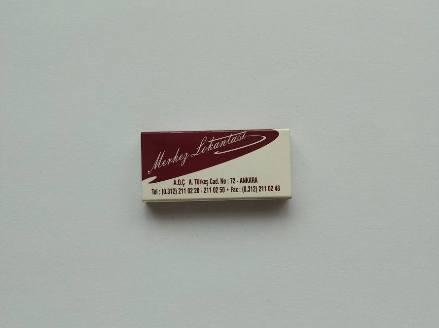 Merkez Lokantası promotional matchbox featuring restaurant branding and contact details in Ankara.