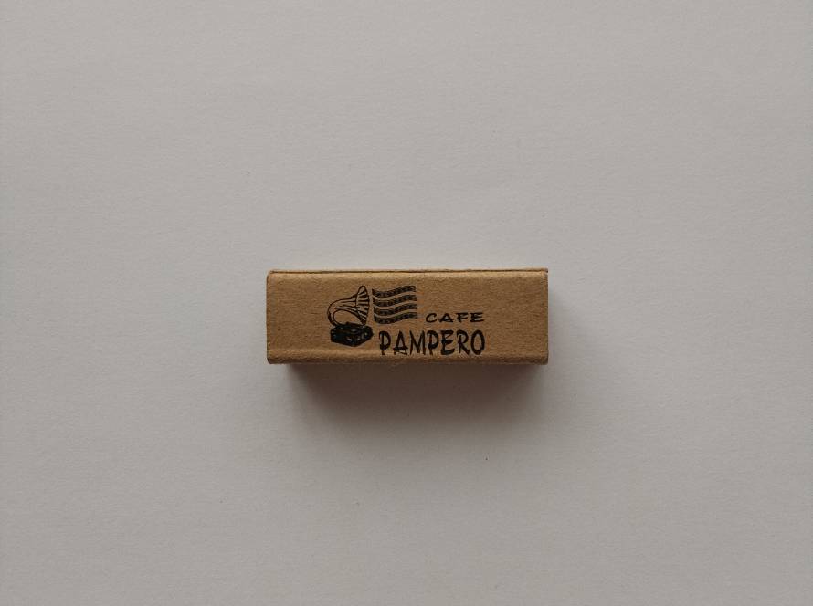 Café Pampero promotional matchbox displaying café branding, website, and contact details in Ankara. A collectible advertising piece from the food and beverage sector.