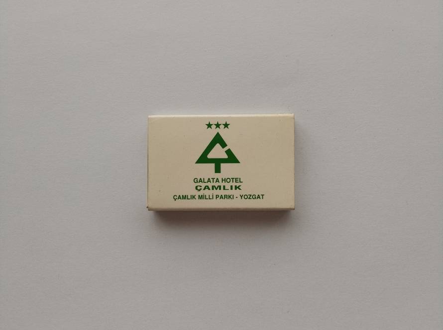 Promotional matchbox for Galata Hotel Çamlık located in Çamlık National Park, Yozgat. Features hotel logo, contact information and hospitality branding.