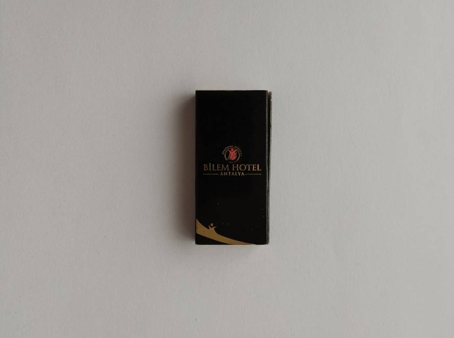 Premium black-and-gold promotional matchbox for Bilem Hotel Antalya, featuring luxury hospitality branding.