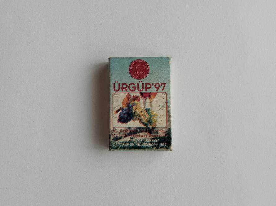 Commemorative matchbox produced for the 10th International Wine Competition held in Ürgüp, Cappadocia, in 1997. Features grape and wine-themed artwork.