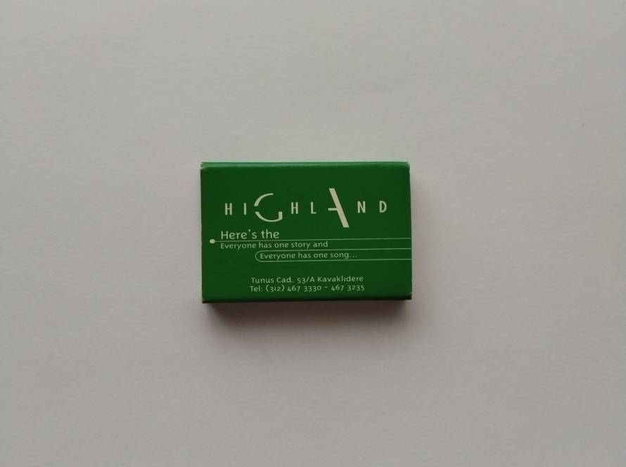 Promotional matchbox for Highland venue in Kavaklıdere, Ankara, featuring bilingual slogan and nightlife branding.
