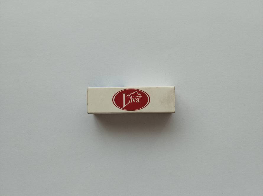 Promotional matchbox featuring the classic Liva confectionery and café logo in a simple branded design.