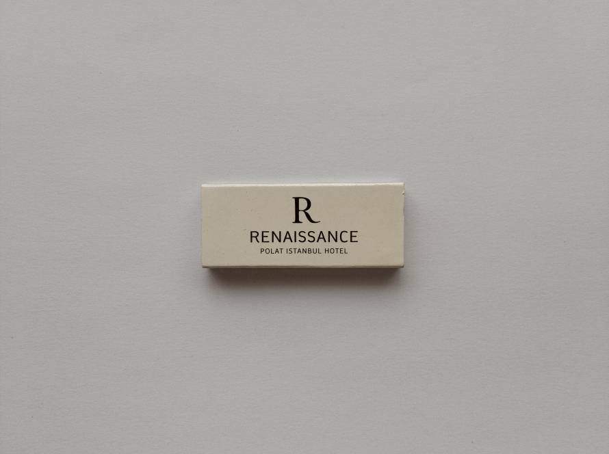 Elegant minimalist Renaissance Polat Istanbul Hotel promotional safety matchbox with clean typography on both sides.