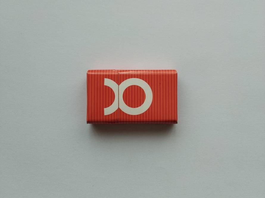 Promotional matchbox for Binboa Red Apple Vodka, featuring bold graphic artwork and Turkish advertising slogan.