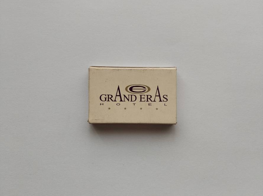 Promotional matchbox for Grand Eras Hotel in Kayseri. Elegant minimalist design representing a modern Turkish hotel.