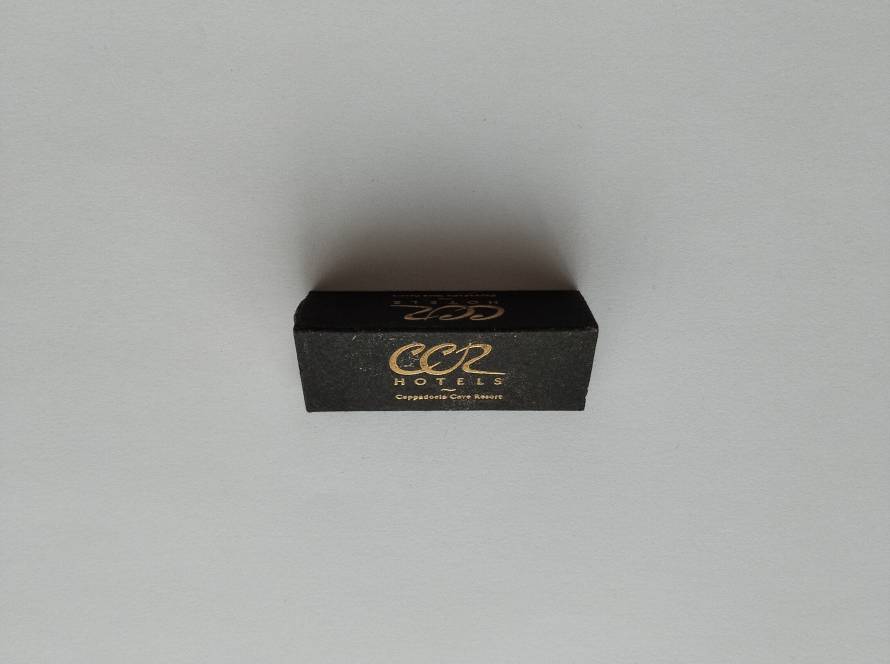 Promotional matchbox for CCR Hotels – Cappadocia Cave Resort. Elegant black design with gold logo. Hotel advertising collectible from Cappadocia.