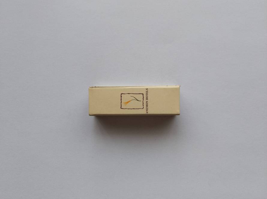 Promotional matchbox for Anemon Hotels featuring the hotel group's branding. Hotel advertising collectible.